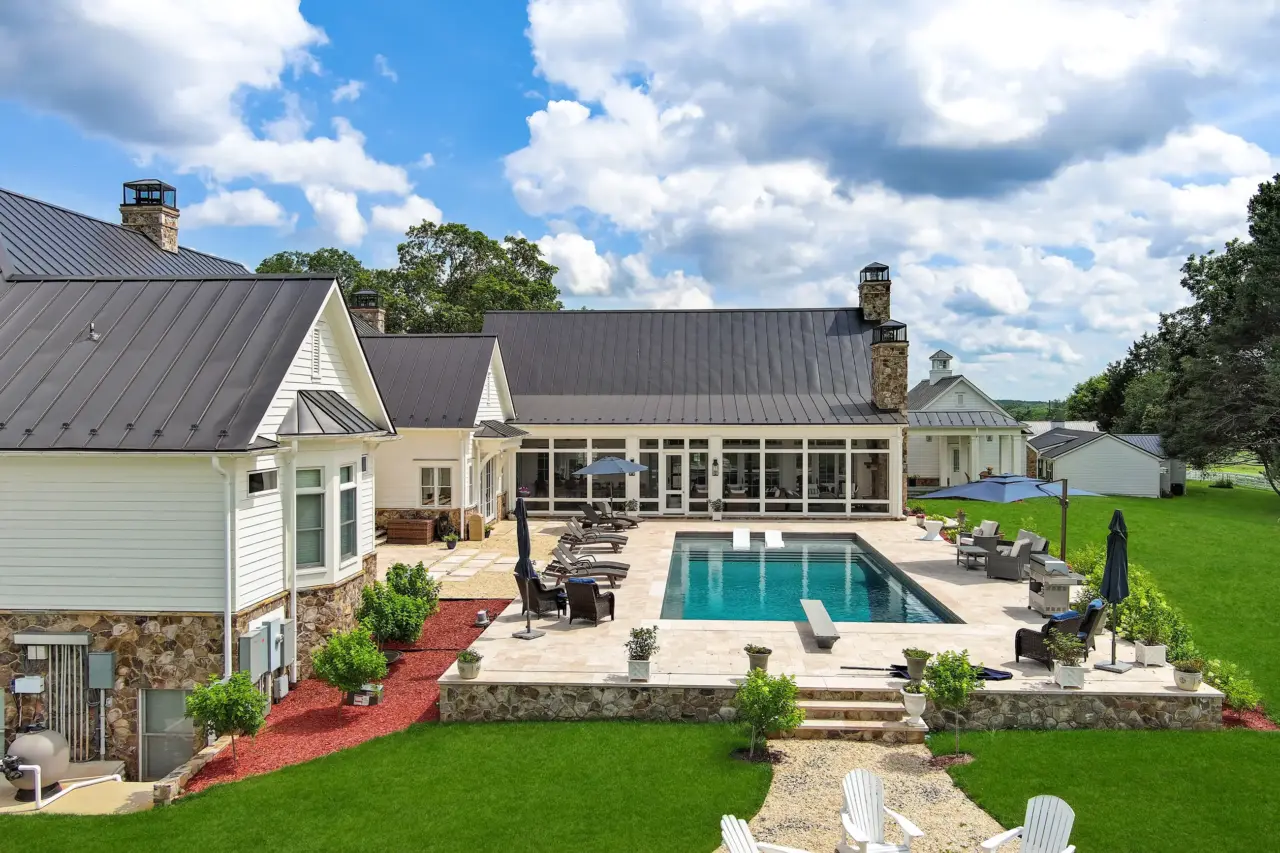 Magnolia Farm exterior with pool and garden view