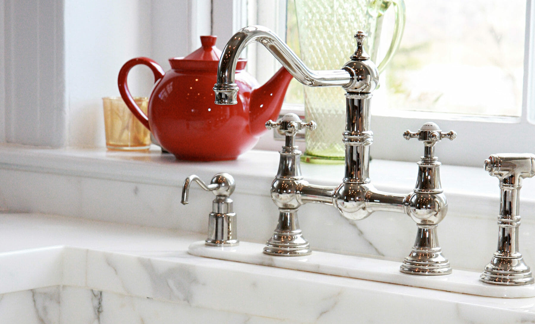 Silver kitchen faucet installed by Gibson, Magerfield, Edenali Builders in Albemarle County